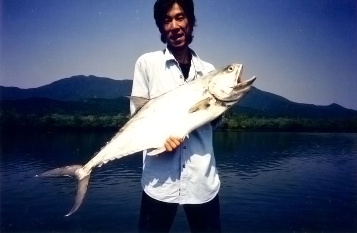 man with queenfish