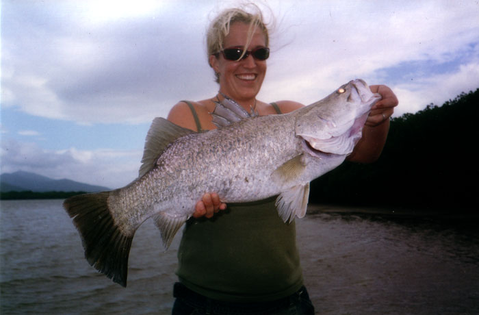 lady with her barramundi catch